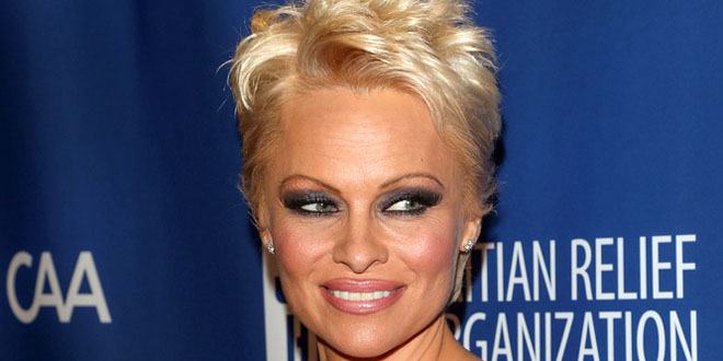 Pamela Anderson - Age, Family, Bio | Famous Birthdays